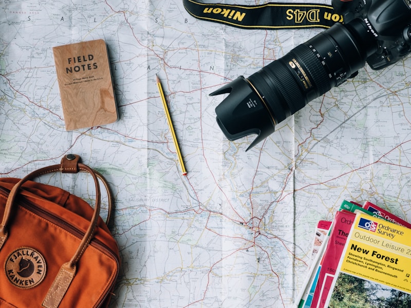 Travel plan with map and notes on a table